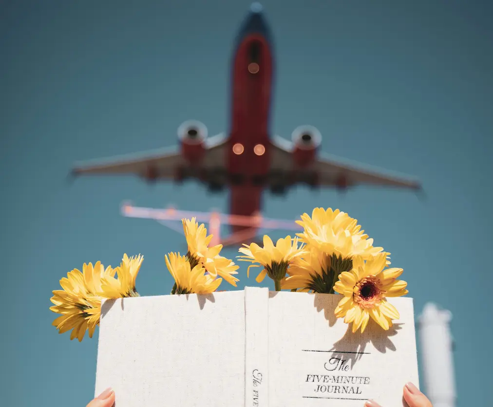 Chauffeured black sedan staged for an airport pickup