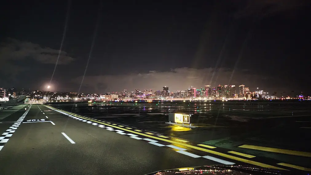 Cadillac SUV driving on Private terminal at San Diego