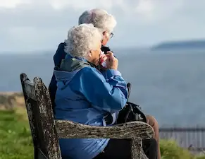 Older couple riding comfortably